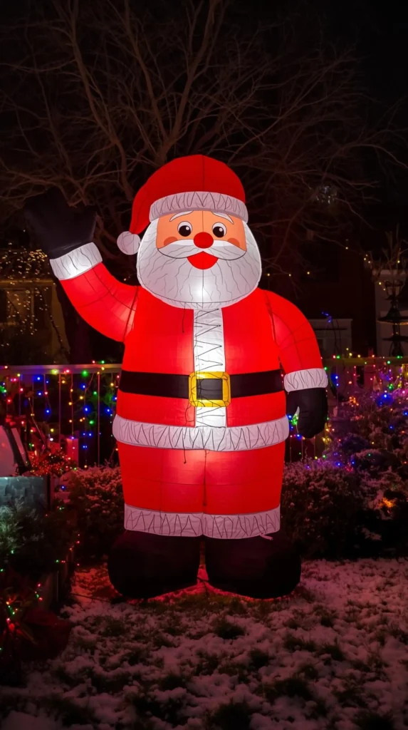 30 Best Christmas Home Decor outdoor Ideas for a Festive Look 19 Inflatable Santa Claus for a Fun Holiday Display