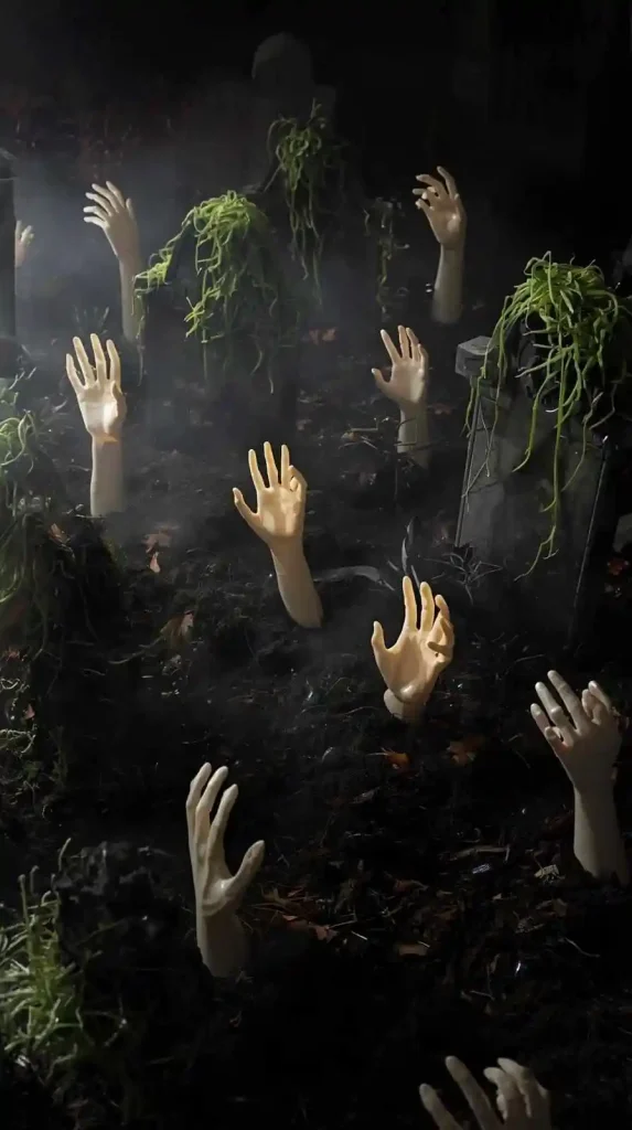 27 Best Halloween Home Decor Outdoor DIY Ideas for 2025 4 Creepy Hand Graveyard