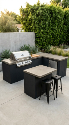 18 Easy Outdoor Kitchen DIY Ideas Modern L-Shape Build 1 1. Cinder Block L-Shape With Concrete Countertop and Black Stucco Finish