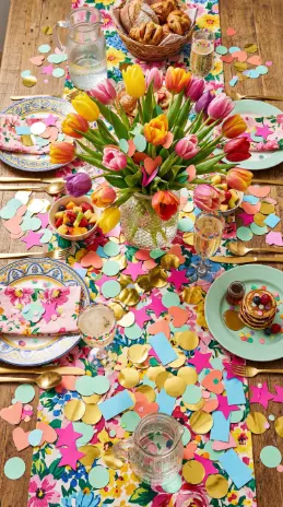 22 Spring Table Decor Ideas - Dopamine Colorful Brunch Style 13 13. Confetti Sprinkled Directly on the Table