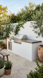 18 Easy Outdoor Kitchen DIY Ideas Cinder Block Grill Station 2 2. Cinder Block Grill Station With White Stucco Finish and Concrete Countertop