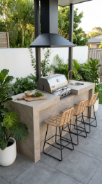 18 Easy Outdoor Kitchen DIY Ideas Cinder Block Grill Station 3 3. Cinder Block Grill Station With Large-Format Tile Cladding