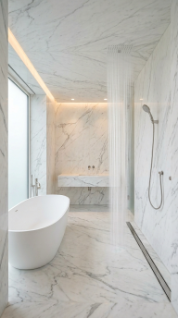 18 Incredible Luxury Bathroom Ideas White Marble Glamour 4 4. White Marble Wet Room With Frameless Glass and Rain Shower