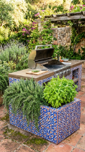 18 Easy Outdoor Kitchen DIY Ideas Cinder Block Grill Station 7 7. Cinder Block Grill Station With Mosaic Tile Finish and Built-In Herb Planter