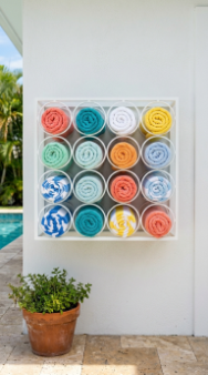 18 Pool Towel Storage Ideas to Keep Your Pool Area Tidy 11 11. Repurpose a Vintage Wine Rack for Rolled Pool Towel Display