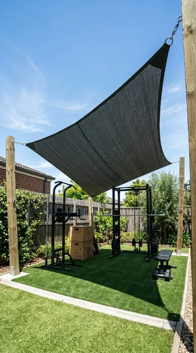 14 Budget-Friendly Home Gym Designs Outdoor Backyard Turf 9 9. Add a Timber Pergola or Shade Sail for Overhead Cover