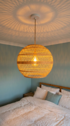 17 Bedroom Aesthetic Coastal Grandmother Sea Glass Blue 12 12. A Beaded or Rattan Pendant Light Above the Bed