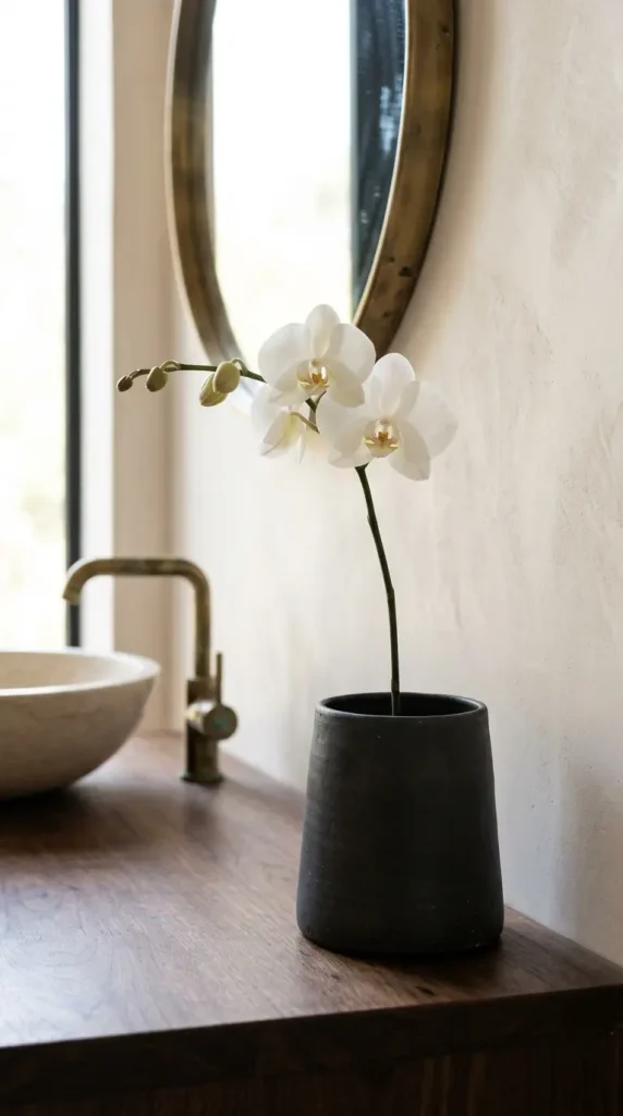 24 Modern Bathroom Plant Aesthetic Japandi Bonsai Minimal 18 18. Orchid in a Minimal Ceramic Vessel as Bathroom Accent