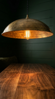 13 DIY Breakfast Nook Dark Green Shiplap Moody Corner 5 5. Hang a Low Aged Brass Dome Pendant Directly Over the Table