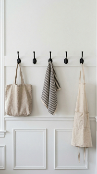 14 DIY Breakfast Nook Farmhouse Wainscoting Storage Bench 6 6. Install a Row of Black Iron Coat Hooks on the Wainscoting Wall 1