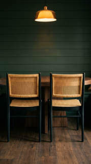 13 DIY Breakfast Nook Dark Green Shiplap Moody Corner 9 9. Introduce Rattan Dining Chairs With Dark Stained Frames for Material Contrast
