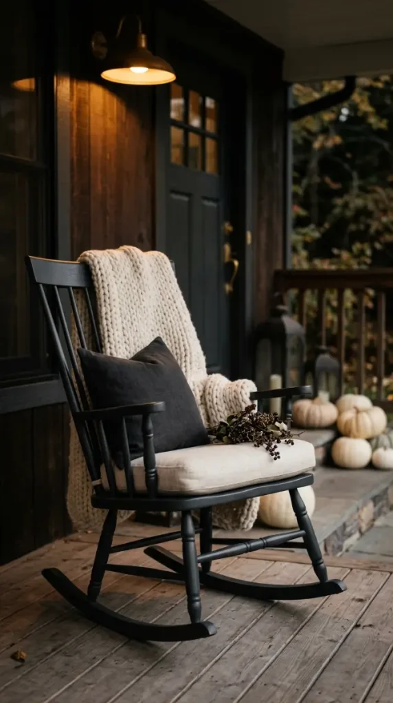 12 Neutral Halloween Decor Ideas for a Chic Front Porch 11 11. Cream Linen Porch Cushions and Throw on Rocking Chair