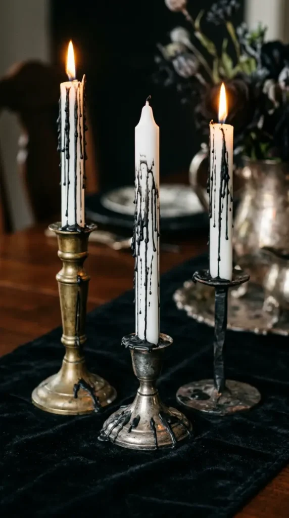 15 DIY Halloween Centerpieces Gothic Candelabra Dinner Table Look 2 2. Drip Black Wax Down White Taper Candles for Gothic Drama